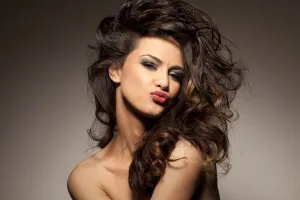 marvelous beautiful brunette posing in the studio - hair styling